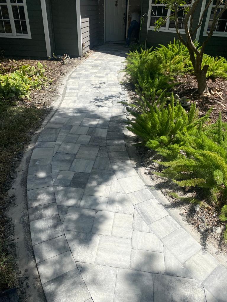 Pool deck travertine installation in Venice, FL