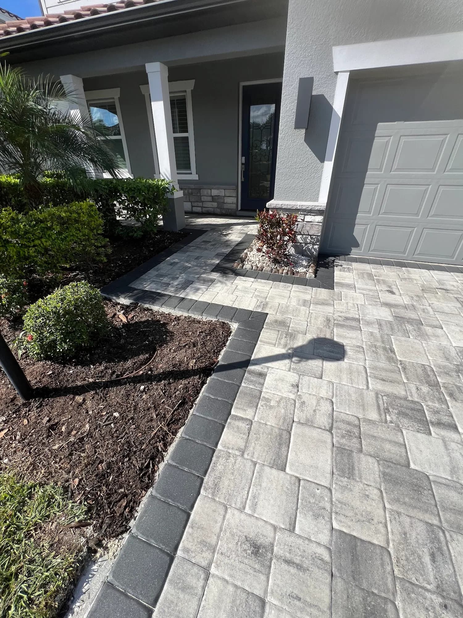 Front-entry paver walkway to a home in Parrish, FL