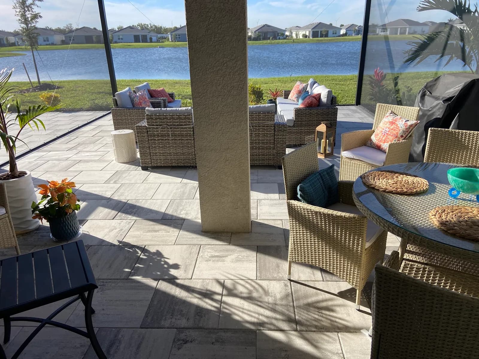 Screened lanai with paver flooring and lake view in Bradenton, FL